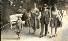 At left, with his family in Germany, 1930