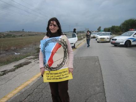 A demonstrator with the poster of the protest