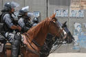 Mounted police attack
