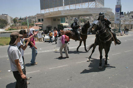 Mounted police attack