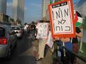 "Negotiations and not Power!" - demonstrators opposite the Minisdtry of Defense in Tel-Aviv 
