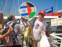 Peace activists Beate Zilversmidt and Adam Keller, two of the organizers, leaving the boat