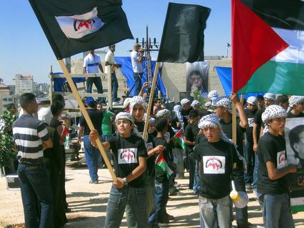 Flags waving: Palestinian youth movements paying last respect