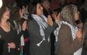 A group of Jewish and Arab women shouts slogans