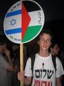Borders abolished: a member of Peace Now carrying the Gush Shalom emblem